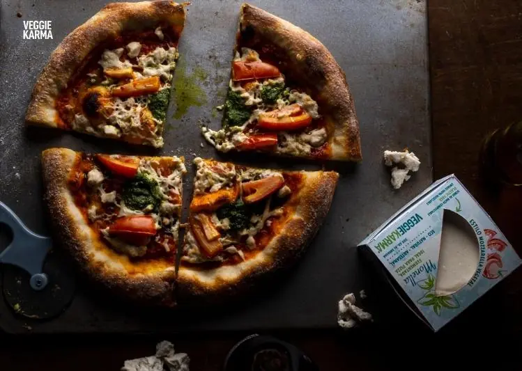 Close-up of a pizza with melted plant-based mozzarella-style alternative